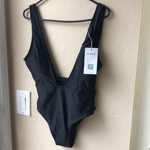 SEXY Low low cut one piece with high cut bottom!